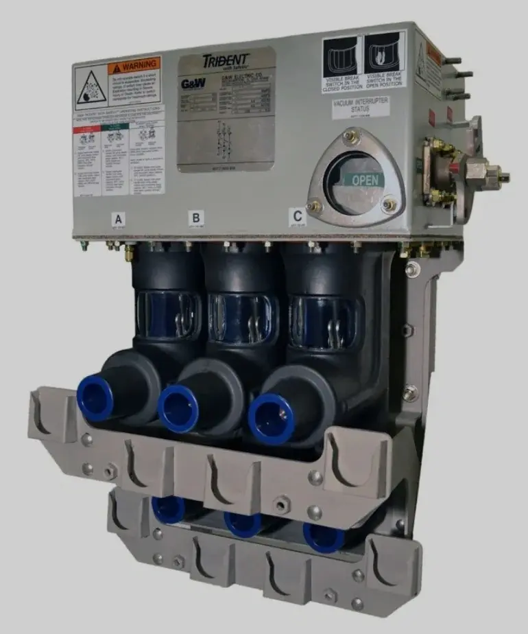 Electrical switchgear with three circuit breakers.