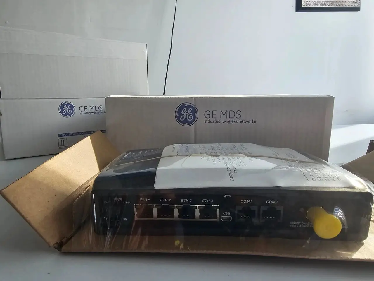 GE MDS wireless modem in packaging box.