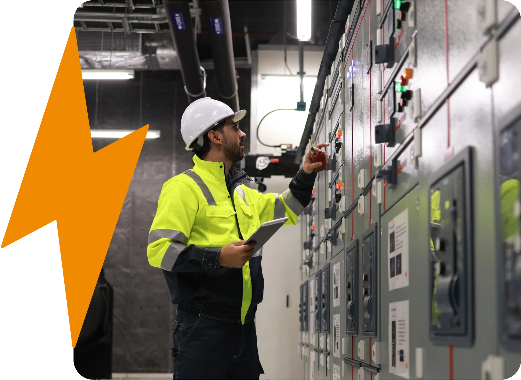 Engineer inspecting electrical control panel.