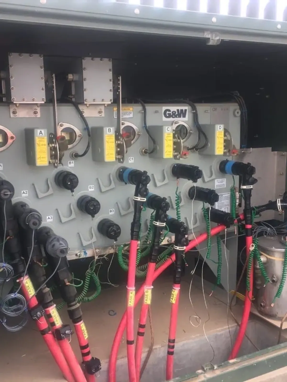 Electrical equipment with cables and connectors.