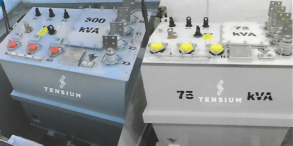 Two industrial electrical transformers labeled with kVA.