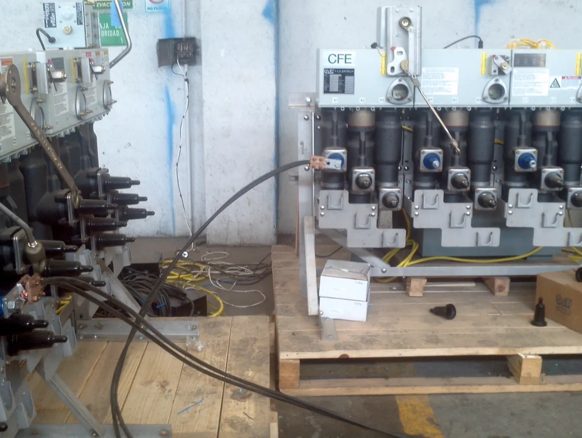 Electrical equipment with cables on wooden pallets.