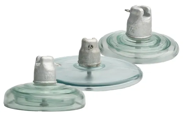 Glass electrical insulator discs on display.