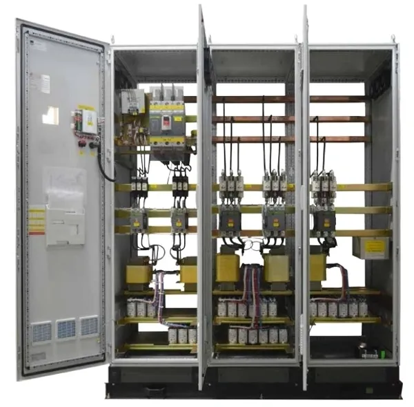 Industrial electrical switchgear with open panels.
