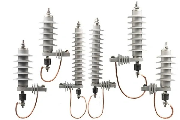 Electrical insulators with cables arranged vertically.