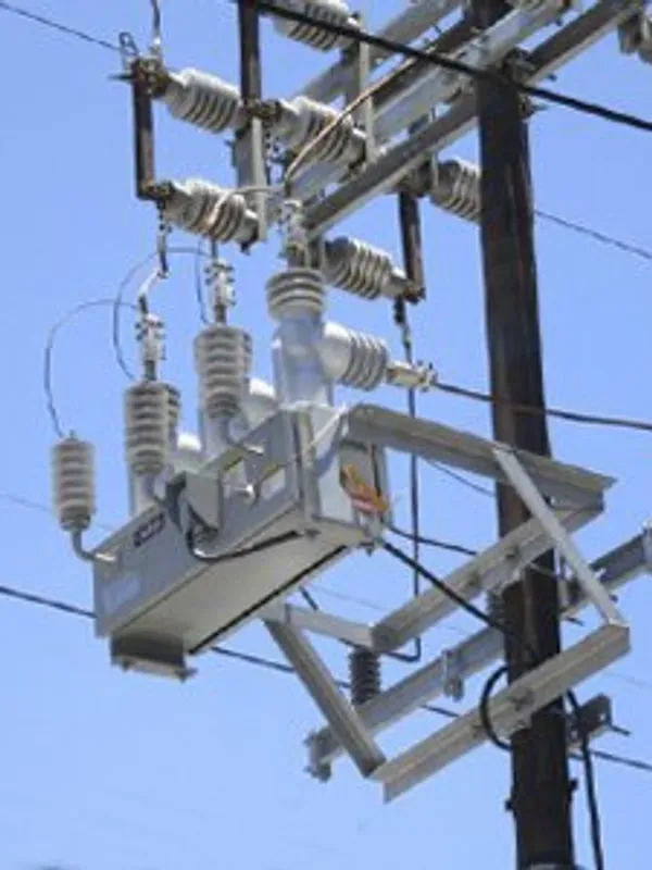 Electrical transformer on a utility pole.