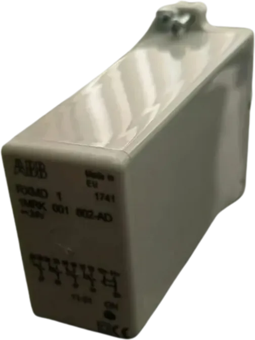 White electronic component with printed text.