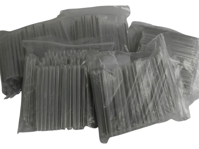 Plastic straws in clear packaging bags.