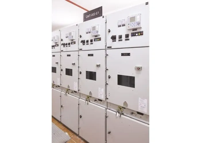 Electrical control panels in a utility room.