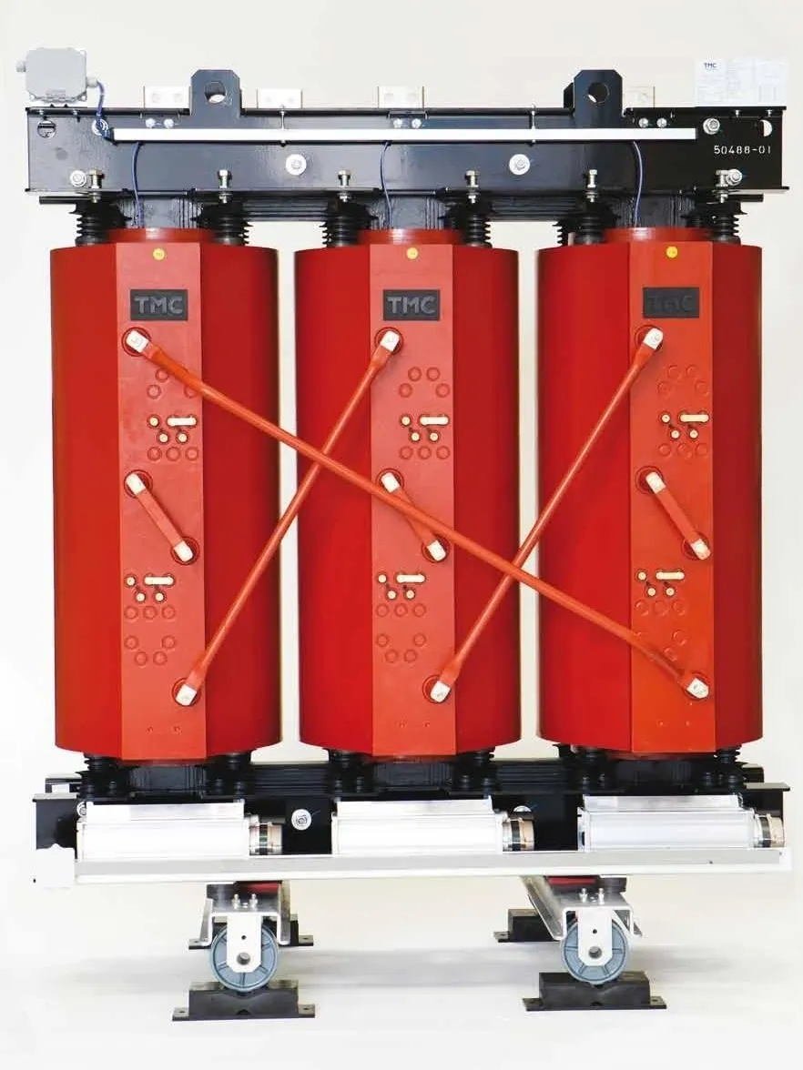 Red electrical transformer with three coils.