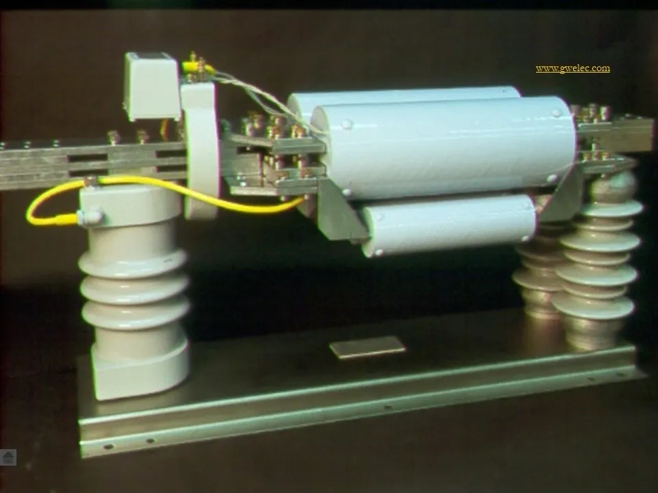 Electrical component with cylindrical parts and wires.